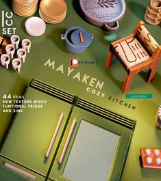 a magazine cover with green furniture and other items on the counter top in front of it