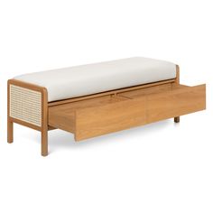 a wooden bench with a white cushion on the top and bottom drawer open to reveal a storage compartment