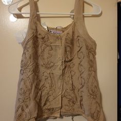 Embroidered Top Beige Embellished Sleeveless Top, Sleeveless Embellished Beige Top, Casual Embellished Tank Top For Spring, Fitted Embellished Embroidered Top For Summer, Fitted Embellished Beige Tops, Embroidered Fitted Tank Top For Spring, Spring Festival Embroidered Tank Top, Fitted Embroidered Tank Top For Spring, Spring Festival Embellished Tops