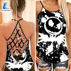 Jack Skellington Black Painted Criss-Cross Tank Top – the perfect addition to any summer wardrobe. This top is made from a soft and lightweight material that feels comfortable against the skin. The criss cross design on the back adds a stylish touch to this classic tank top. The open back allows for breathability and freedom of movement, making it perfect for outdoor activities and workouts. The tank top is available in a variety of colors and sizes to suit your personal style and fit pref Stretch Strappy Summer Tops, Strappy Stretch Summer Tops, Strappy Stretch Tops For Summer, Trendy Stretch Crisscross Tops, Trendy Spring Crisscross Tops, Black Sleeveless Top With Crisscross Straps, Trendy Summer Tops With Crisscross Shape, Trendy Summer Crisscross Top, Trendy Summer Top With Crisscross Neckline