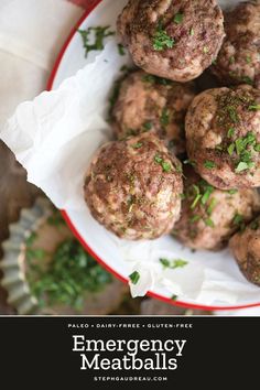 some meatballs are in a red and white bowl