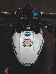 the back end of a motorcycle with a helmet on it