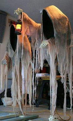 some fake ghost like things hanging from the ceiling