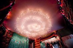 the ceiling is decorated with lights and decorations