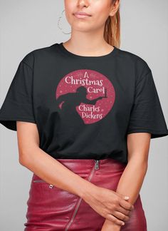 Chales Dickens classic Christmas tale A Christmas Carol The unisex heavy cotton tee is the basic staple of any wardrobe. It is the foundation upon which casual fashion grows. All it needs is a personalized design to elevate things to profitability. The specialty spun fibers provide a smooth surface for premium printing vividity and sharpness. No side seams mean there are no itchy interruptions under the arms. The shoulders have tape for improved durability.  .: 100% Cotton (fiber content may var Christmas Carol Charles Dickens, Disc Golf Shirt, December Christmas, Christmas Tale, Bah Humbug, A Christmas Carol, Golf T Shirts, Charles Dickens, Diy Stuff