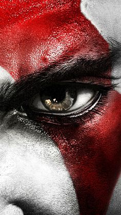 a close up of a person's face painted in red and white