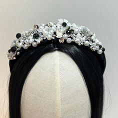 Stunning Black, White and Pearl Beaded Headband. Created using a mix of Beads, Crystals, Pearl beads and Silver and Pearlized Flowers. Each Bead has been hand sown onto a Velvet Padded Headband, the width is approx 5cm Beautiful for the Holiday Season, Christmas and New Year Parties. Wedding Guest also Ideal for the Mother of the Bride. A real talk about piece, this statement headband will make you the bell of the ball. This will arrive Gift wrapped and packed well for Shipping. Thank you for vi White Pearl Headband, Statement Headband, Christmas Weddings, Padded Headband, Beaded Headband, Pearl Headband, New Years Party, Nouvel An, Hair Accessories Headbands