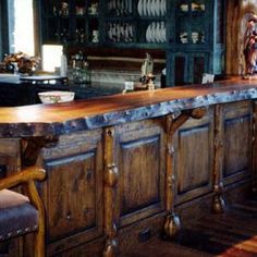 an old fashioned bar with chairs around it