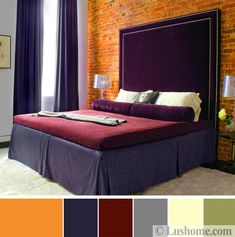 a bedroom with brick walls and purple bedding