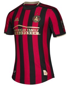 a black and red striped soccer jersey with the american family logo on it's chest