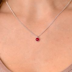 This dainty Ruby stone pendant necklace has a delicate chain. The chain is gold plated sterling silver 925., and there is an extension so that the size can be adjusted. The stones are natural stones and no 2 are identical, but they are similar. If you would like a custom order or have any questions please contact me, thanks. Dainty Birthstone Necklace With Adjustable Chain, Delicate Sterling Silver Birthstone Necklace With Adjustable Chain, Dainty Pendant Birthstone Necklace With Clavicle Chain, Dainty Birthstone Pendant Necklace With Clavicle Chain, Sterling Silver Solitaire Necklace With Cable Chain, Sterling Silver Solitaire Necklace With Cable Chain Gift, Dainty Birthstone Necklace With Delicate Pendant Chain, Delicate Sterling Silver Charm Necklaces With Cable Chain, Delicate Sterling Silver Charm Necklace With Cable Chain