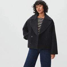 Nwt Everlane The Rewool Peacoat Size M Color: Heathered Black From Armpit To Armpit - 21.5" Length - 23" Sleeves - 23.5" A Modern Peacoat You’ll Wear For Years To Come. The Rewool Peacoat Features A Notched Collar, A Double-Breasted Front, Two Handy Side Pockets, A Center Zip, And A Boxy, Oversized Shape. Plus, It’s Made Of Soft Recycled Wool, Which Makes It Extra Warm And Better For The Planet. 80% Recycled Wool, 12% Recycled Nylon, 7% Recycled Polyester, 1% Other Fibers Lining 100% Recycled Po Black Pea Coat Outfit, Pea Coat Outfit, Peacoat Womens Outfit, Classic Coats, Fall Coat, Coat Outfits, Line Jackets, Notched Collar, Wool Jacket