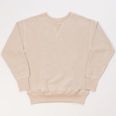 At Son of a Stag, we believe that Warehouse & Co might have the secret of making the perfect sweatshirt. Having not changed the design for 20 years now, the brand’s famous 401 sweatshirt is a quality garment with timeless design. Crafted from luxuriously soft 100% cotton fleece, this sweat is a classic 1940’s shape which features a slightly longer knitted cuff and waistband, a drop shoulder, and an iconic double v neck construction. This fabric has been specially woven by the brand on vintage lo Plain Sweatshirt, Long Knit, Jersey Design, Cotton Fleece, Light Denim, Machine Knitting, Knit Cuff, Drop Shoulder, 20 Years