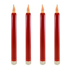 three red candles are lined up in a row