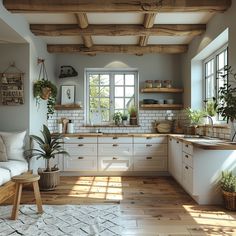 a kitchen filled with lots of white furniture next to a wooden floor covered in potted plants