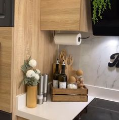 the kitchen counter is clean and ready to be used as a wine rack, soap dispenser