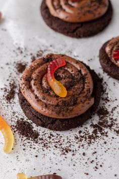 chocolate cookies decorated with candies and powdered sugar