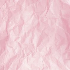 a pink paper texture background that looks like it has been crumpled in half and is very soft