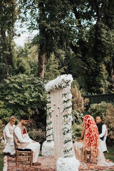 the bride and groom are getting ready to walk down the aisle at their wedding ceremony