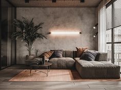 a living room filled with furniture and a potted plant on top of a table