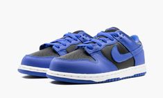 The Nike Dunk Low PS “Hyper Cobalt” is the preschool sizing of the February 2021 colorway of the popular low-top shoe that originally debuted in 1985.  After taking the college basketball and skateboarding worlds by storm in the ‘80s, ‘90s, and 2000s, the Nike Dunk hit the scene recharged in 2020 with hyper-limited collaborations and retro colorways introducing the silhouette to a new generation of sneaker collectors.  The “Hyper Cobalt” colorway features black leather on the perforated toe and Black Dunks, Haikou, Stadium Goods, Nike Kids, Nike Dunk Low, Dunk Low, Blue And Black, Nike Dunk, Nike Dunks