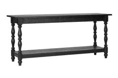 a black wooden shelf with two legs and one shelf on the bottom is holding an empty bottle