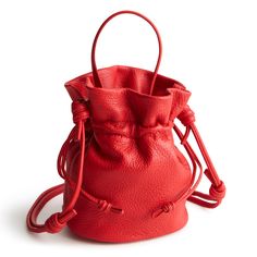 Elevate your everyday look with the Tilden Drawstring Crossbody, a pouch-style purse that combines casual charm with contemporary flair. The easy-to-use drawstring closure adds a touch of laid-back elegance, while the compact silhouette is perfect for carrying your essentials in style. Whether you're out for a casual lunch or exploring the city, this versatile crossbody bag keeps you effortlessly chic and hands-free. Experience the perfect blend of simplicity and sophistication with the Tilden D Red Travel Bucket Bag With Phone Pocket, Red Travel Bucket Bag With Mobile Phone Pocket, Red Travel Bucket Bag With Mobile Phone Holder, Red Bucket Bag With Removable Pouch, Red Bucket Bag With Detachable Strap, Red Crossbody Bucket Bag For Travel, Red Mobile Phone Pouch For Everyday Use, Red Bucket Bag With Dust Bag For Everyday, Everyday Red Pouch Bucket Bag