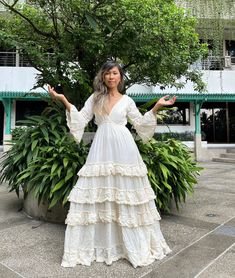 Handmade layer Deep v neck lace trim  wedding dress. Angel sleeves with lace trim. Double fabric on the chest and back. Lined. Cream color. Elastic waist. each layer with lace trim and fringe. Fringe and lace the color is darker cream if compare with the fabric. Model 5'6 wear 2 inches heels in the photo. One size as the Measurements. Chest: stretch up to 45 inches. Waist 22 stretch up to 45 inches. Sleeve  Hip 52 inches (measure from the inside lining) Length 57 in after iron will be 58 inches. (good length for the wedding dress style) CARE: Machine wash cold. NOTE: All the dresses are already been wash it part of the process. COLOR OF THE DRESS IS SAME AS THE LAST PHOTO Selkie Wedding Dresses, Floor-length Ruffled Maxi Dress For Wedding, Wedding Floor-length Maxi Dress With Ruffle Hem, Wedding Maxi Dress With Floor-length Ruffle Hem, Floor-length Maxi Dress With Ruffle Hem For Wedding, Ruffled Empire Waist Maxi Dress For Garden Party, Bohemian Tiered Dress With Ruffles For Garden Party, Wedding Ruffle Hem Maxi Dress, Bohemian V-neck Maxi Dress For Maternity