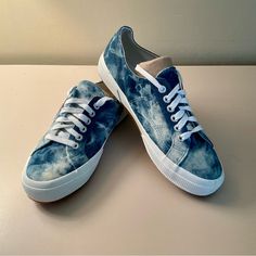 Nwot! Superga Denim Multi Tie-Dye Sneakers, Size 9 Walk Around Town In Style With The Superga 2750 Denim Multi Tie-Dye Sneakers! These Super Chic Canvas Sneakers Have An Allover Blue And White Tie-Dye Pattern That Mimics Your Favorite Distressed Jeans! Lace-Up Front, Silver Hardware, Logos At The Outstep And Heel, And 1.5" White Bumper Sole. Man-Made Materials. Imported. Lightly Cushioned Insole. Rubber Sole Has Nonskid Markings. All Of My Listings Come From Pet Free, Smoke Free Home. Denim Blue Cotton Lace-up Sneakers, Blue Slip-on Cotton Canvas Shoes, Blue Cotton Slip-on Canvas Shoes, Blue Cotton Slip-on Sneakers, Casual Denim Slip-on Sneakers, Casual Denim Sneakers With Vulcanized Sole, Lace-up Denim Sneakers With Rubber Sole, Casual Denim Canvas Shoes With Round Toe, Blue Low-top Cotton Canvas Shoes