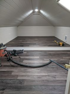 Vinyl plank floor. Tongue and groove paneling. Painted navaho white. Attic Room Renovation, Tiny Attic Bathroom Ideas Slanted Ceiling, Lighting For Attic Ceilings, Attic Renovation Ideas Bedroom, Open Attic Ideas, Turning Attic Into Living Space, Garage Attic Ideas, Large Attic Ideas