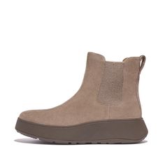 An elevated take on an icon. We've brought a closet staple bang up to date – setting a classic Chelsea boot upper on a superchunky, yet lightweight, sole. Clean. Contemporary. Crafted in soft rich suede, with minimal seaming, and simple lines that complement almost any outfit. Thick stretch panels on both sides (here in a soft textured elastic) and pull tabs ensure easy on/off. Featuring a new flatform-version of our Microwobbleboard™ midsole to deliver unbeatable comfort, non-stop cushioning, a Winter Suede Boots With Vibram Sole, Suede High-top Platform Boots With Lug Sole, High-top Suede Platform Boots For Fall, Adjustable Sandals, Summer Sneakers, Office Shoes, Platform Wedge Sandals, Slides Shoes, Slipper Boots