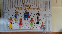 a paper cut out of some cartoon characters on a white board with words fancy dress - competition