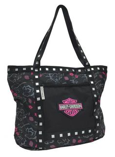 a black bag with pink and white flowers on it's side, featuring the harley davidson logo