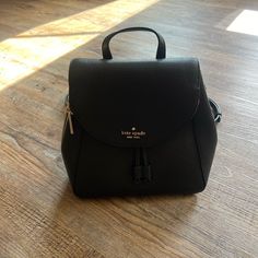 Brand New Black Size Medium Kate Spade. Kate Spade Black Backpack With Removable Pouch, Kate Spade Black Backpack With Detachable Strap, Kate Spade Chic Backpack With Detachable Strap, Kate Spade Black Everyday Backpack, Kate Spade Chic Backpack With Adjustable Strap, Chic Kate Spade Backpack With Detachable Strap, Kate Spade Backpack With Detachable Strap For Errands, Kate Spade Backpack With Adjustable Strap For Errands, Kate Spade Black Standard Backpack