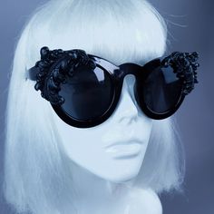 Hand-decorated black filigree ornate sunglasses. These can be made in silver, gold, black, white or red filigree and white or black or red sunglasses if you ask. Please note: There is no readymade sunglasses box large enough for these sunglasses. These sunglasses are wearable art and need to be treated with due care. While i have taken every possible care to make them sturdy throwing them in a bag careless may damage them. Treat them as you would a precious thing... UV400, they are wearable art. Black Gothic Sunglasses For Party, Gothic Black Sunglasses For Party, Gothic Couture, Vampire Fashion, Statement Sunglasses, Dark Beauty Magazine, Sunglasses Box, Uv400 Sunglasses, Red Sunglasses