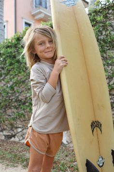 Classic boys and girls swim trunk with a retro fit, made from sustainable ECONYL® recycled nylon in terra cotta brown color. We use UPF50+ fabric that's OEKO-TEX® certified, meaning our swimsuits are safe to wear and more gentle on the earth. We offer gender neutral swimwear for kids, toddler, and baby. Order online now :)