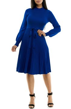 A tonal sash accentuates your figure in a long-sleeve sweater dress with a flattering fit-and-flare profile. 41 1/2" length Mock neck
 Long sleeves 78% rayon, 22% polyester Machine wash, tumble dry Imported Model stats: 5'10" height, 32" bust, 25" waist, 36" hip. Pleated Midi Dress For Fall, Fall Pleated Solid Midi Dress, Elegant Long Sleeve Non-stretch Sweater Dress, Long-sleeve Ribbed Dress, Long Sleeve Solid Color Sweater Dress For Spring, Solid Color Long Sleeve Sweater Dress For Spring, Long Sleeve Stretch Pleated Midi Dress, Long Sleeve Pleated Stretch Midi Dress, Pleated Long Sleeve Stretch Midi Dress