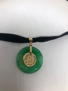 Vintage Green Jade Choker Golden Finish necklace pendant All green Jade set in an ornate silver set with Chinese calligraphy for luck White bronze frame. About 1 in long All jewelry is shipped free in the US in a nice gift box. Check out our over a THOUSAND great reviews Jade Choker, Bronze Frame, Vintage Rainbow, Chinese Calligraphy, Bib Necklaces, Yellow Stone, Green Jade, Jade Green, Handmade Sterling Silver