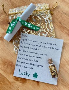 a lucky st patrick's day card with a message attached to it on a wooden table