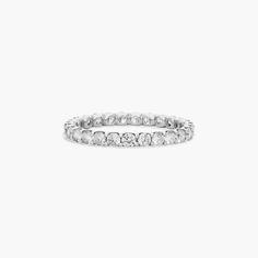 a white gold ring with round cut diamonds