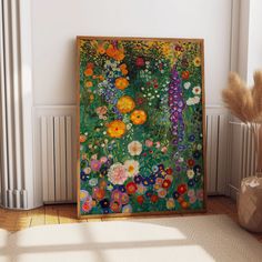 a painting on the wall next to a vase with flowers in it and a radiator