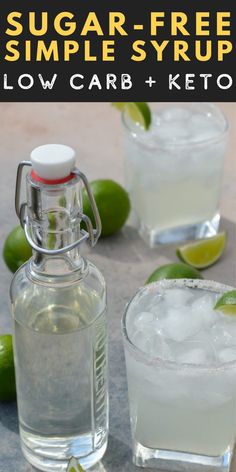 two glasses filled with lemonade and limes next to each other on a table