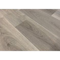 an image of wood flooring that looks like it has been painted in grey tones