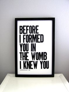 a white and blue poster with the words before i formed you in the womb i knew you