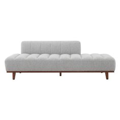 a gray couch with wooden legs on a white background