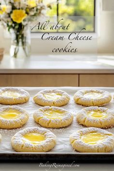 an image of some cookies that are on a baking sheet with lemons in the background