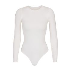 Essential Crew Neck Long Sleeve Bodysuit | Marble — A second-skin bodysuit with an ultra-flattering satin stretch finish, the Long Sleeve Crew Neck Thong Bodysuit is a versatile wardrobe foundation. This bodysuit features a raw cut neckline, snap closure at base, and satin stretch stitch at leg openings for optimal comfort. White Long Sleeve Bodysuit, Body Suit Outfits, White Bodysuit, Body Suit, Long Sleeve Bodysuit, Second Skin, White Long Sleeve, High Waisted Shorts, Shapewear