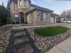 a house that has grass in front of it