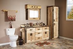 a bathroom with a toilet, sink and wooden cabinet in the corner next to a window