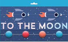 to the moon card with fish and balls on string in front of blue sky background